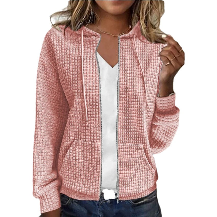Women's waffle-textured hooded jacket with practical pockets and a modern cut, size S