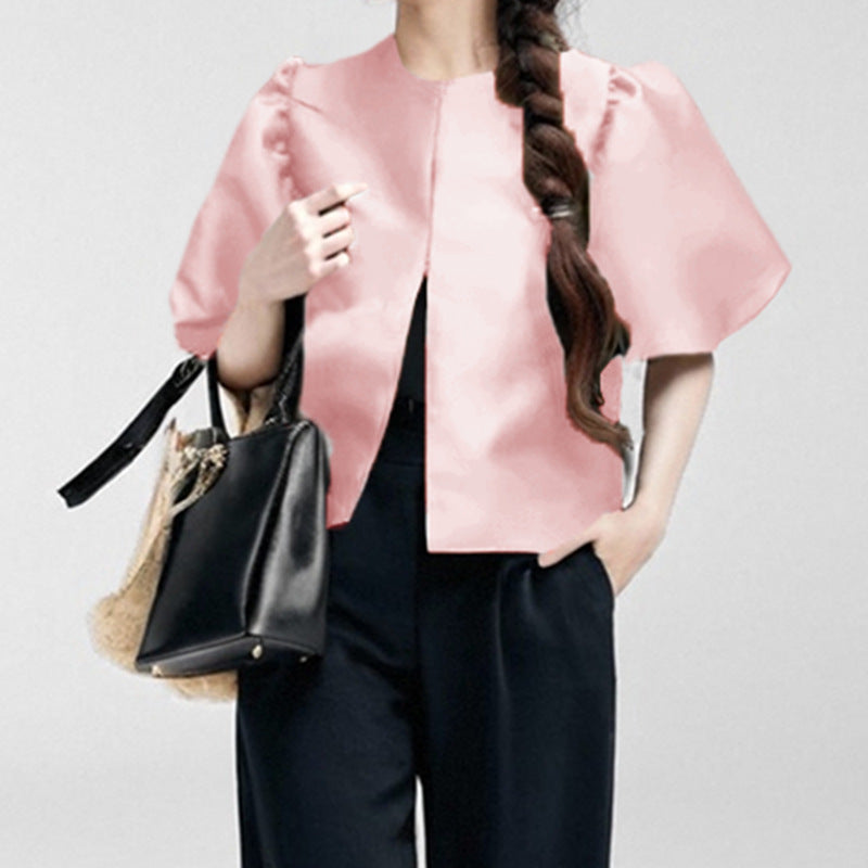 Women's blouse with voluminous puff sleeves and modern design, size S