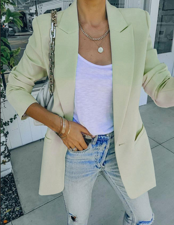 Women's elegant oversized blazer with a structured cut and casual details, size S