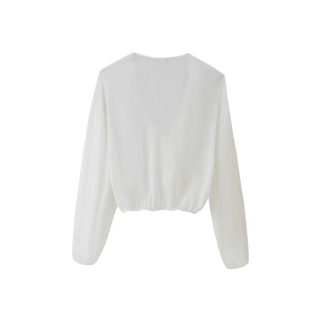 Women's blouse with romantic ruffles and deep V-neck, size