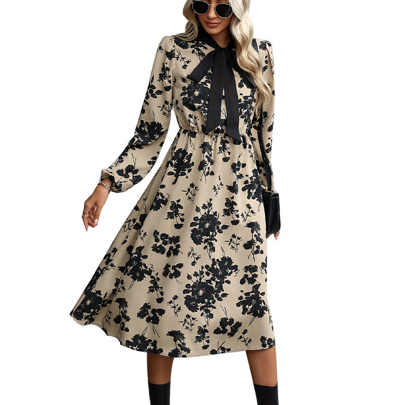 Elegantes Damen-Midikleid mit Blumenmuster und Schleifendetails, Größe