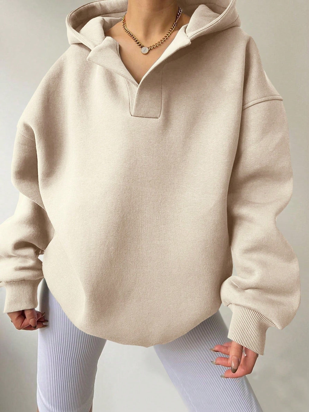 Women's oversized hoodie with a modern collar and relaxed fit, size [size missing]