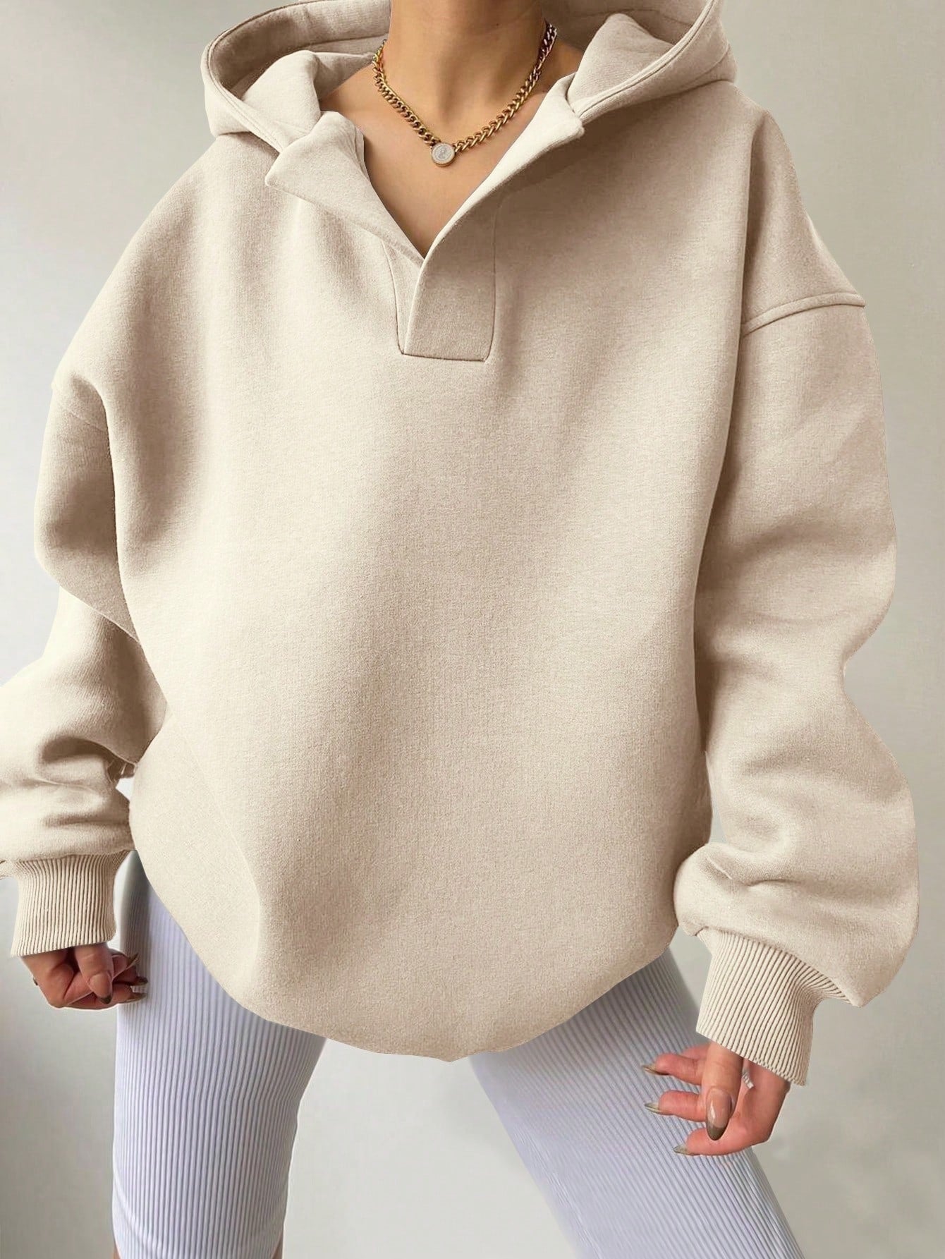 Women's oversized hoodie with a modern collar and relaxed fit, size [size missing]