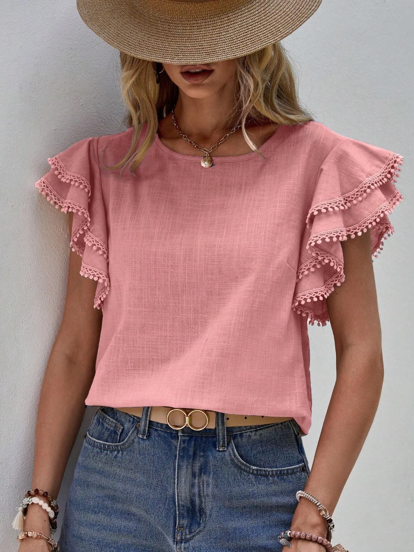 Women's lightweight top with playful ruffles and decorative hem, size [size]