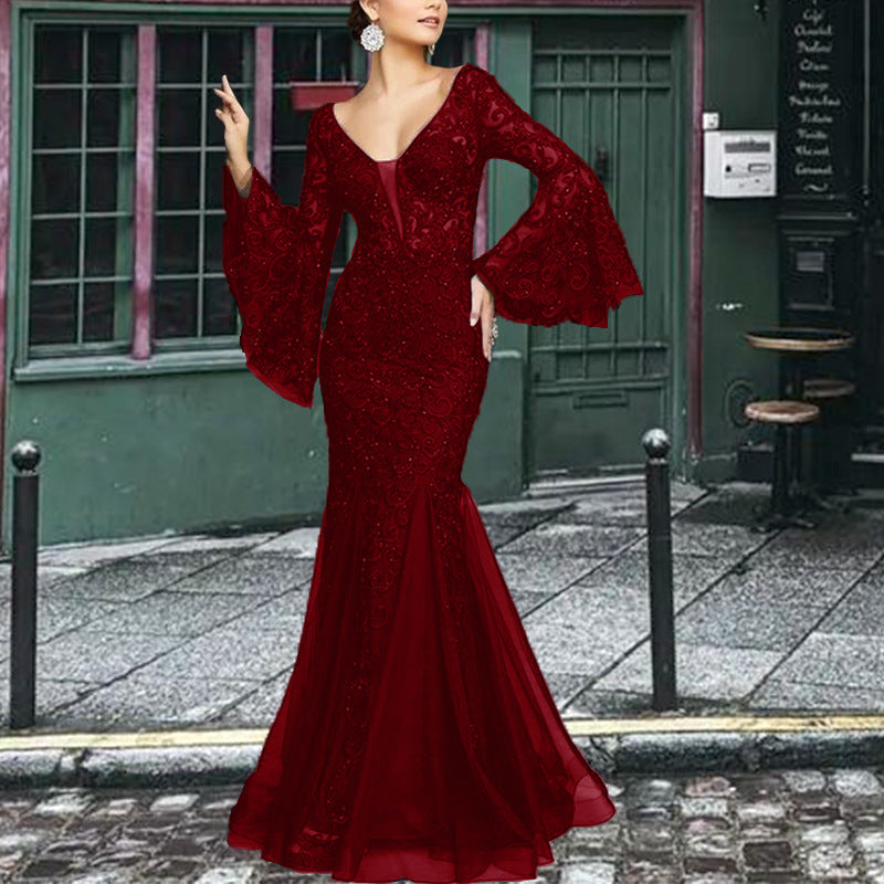 Women's figure-hugging evening dress with shimmering embellishments and elegant V-neck, size S