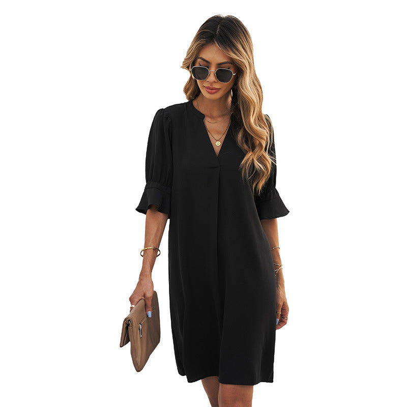 Women's elegant mini dress with a flattering V-neck and puff sleeves, size S