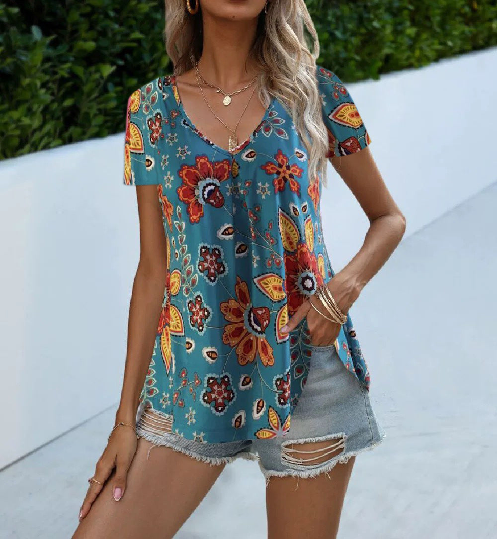Women's floral top with deep V-neck and flowing cut, size