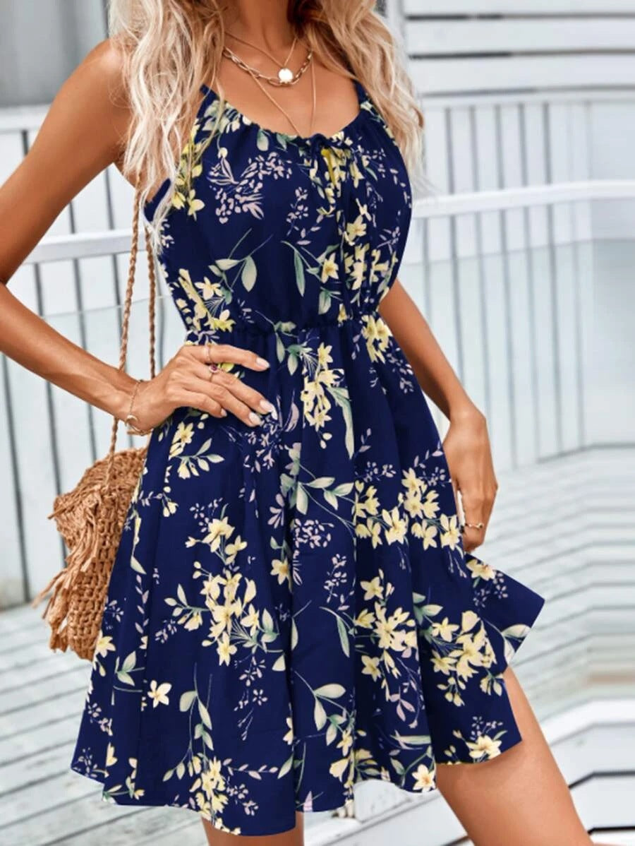 Women's floral dress with adjustable spaghetti straps and elastic waistband, size [size missing]