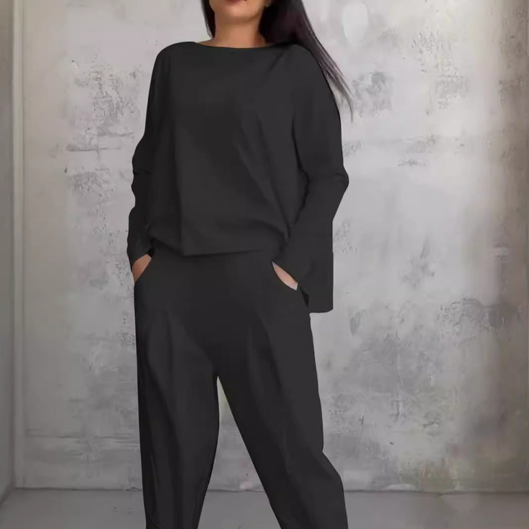Valenzora | Solid color slim-fit trouser suit with round neckline