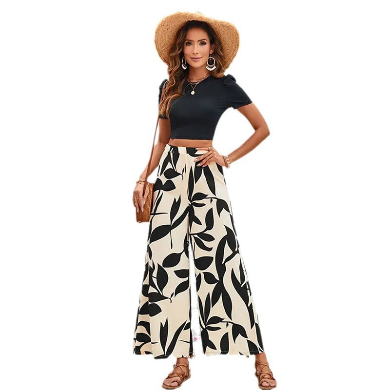 Elegante Damen-Hose mit weitem Bein und Blumenmuster in Größe