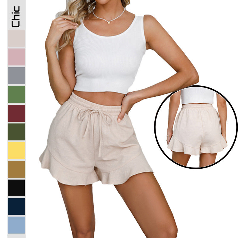 Women's short shorts with a cheerful flounce and elastic waistband, size S