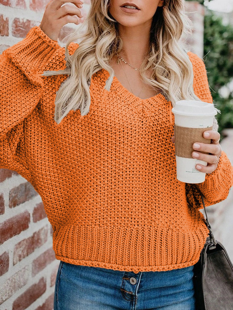 Women's chunky knit sweater with deep V-neck and relaxed fit, size