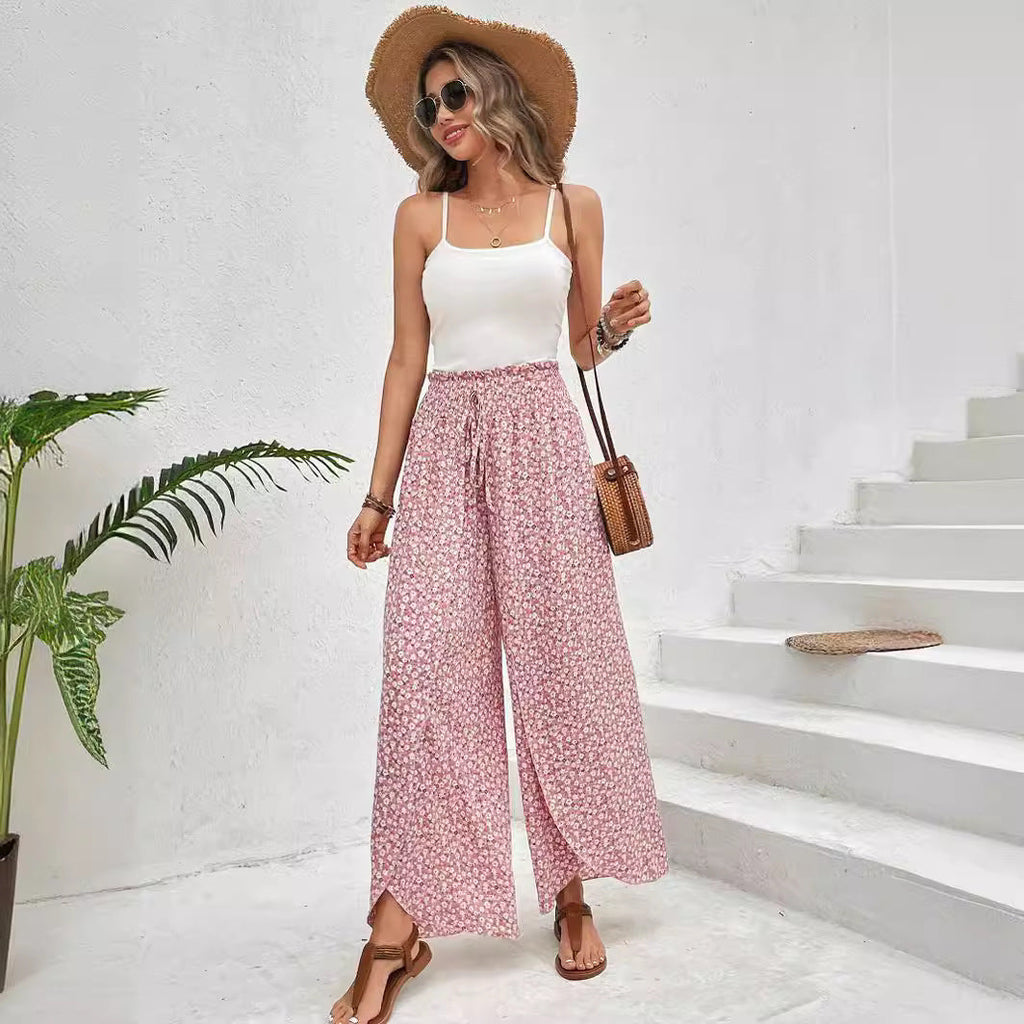Women's wide-leg summer trousers with elasticated waistband and floral design, size S