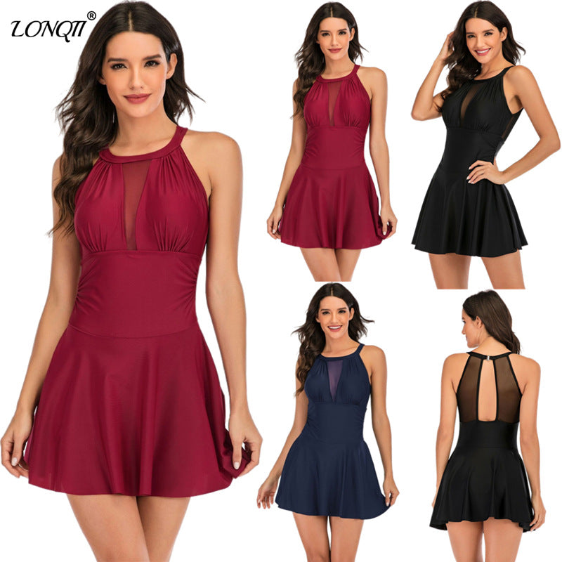 Women's one-piece swimsuit with fashionable mesh top and elegant skirt look, size S