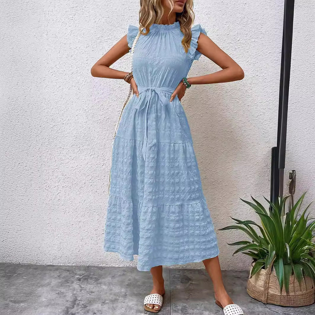Women's wrap dress with ruffle details and a tailored hem, size