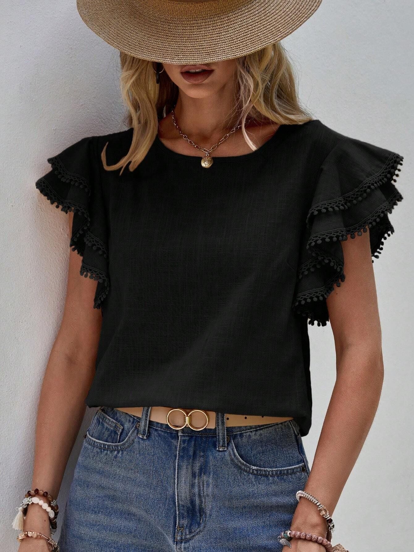 Women's lightweight top with playful ruffles and decorative hem, size [size]