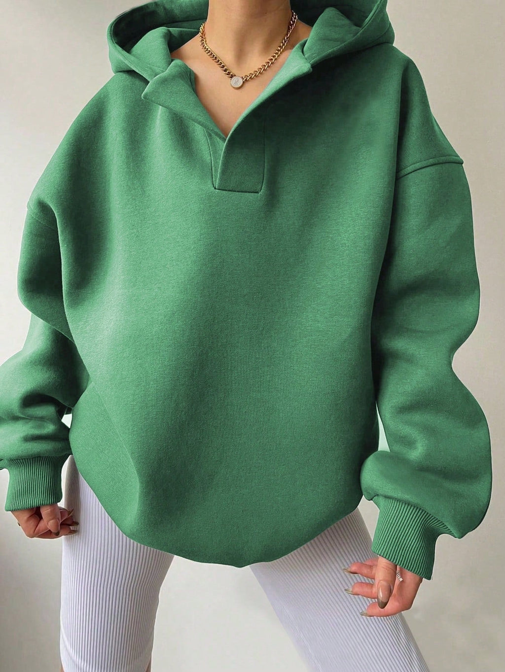 Women's oversized hoodie with a modern stand-up collar and soft materials, size S