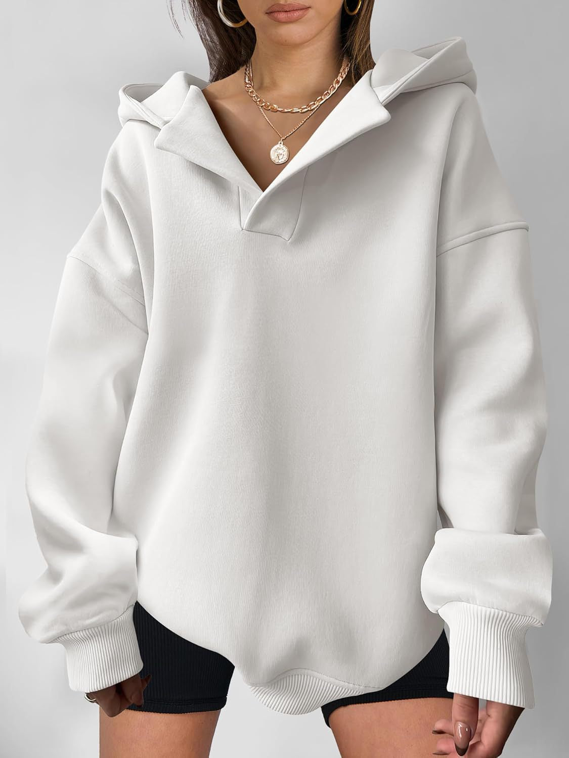 Women's oversized hoodie with a modern stand-up collar and soft materials, size S