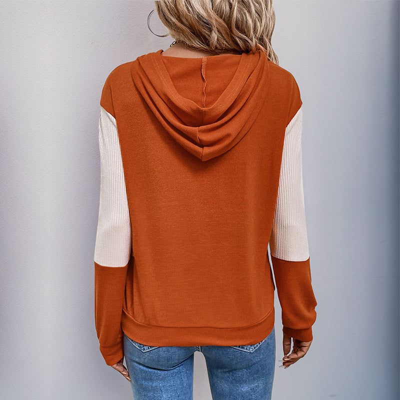 Women's hoodie with a modern V-neck and structured sleeve design, size S