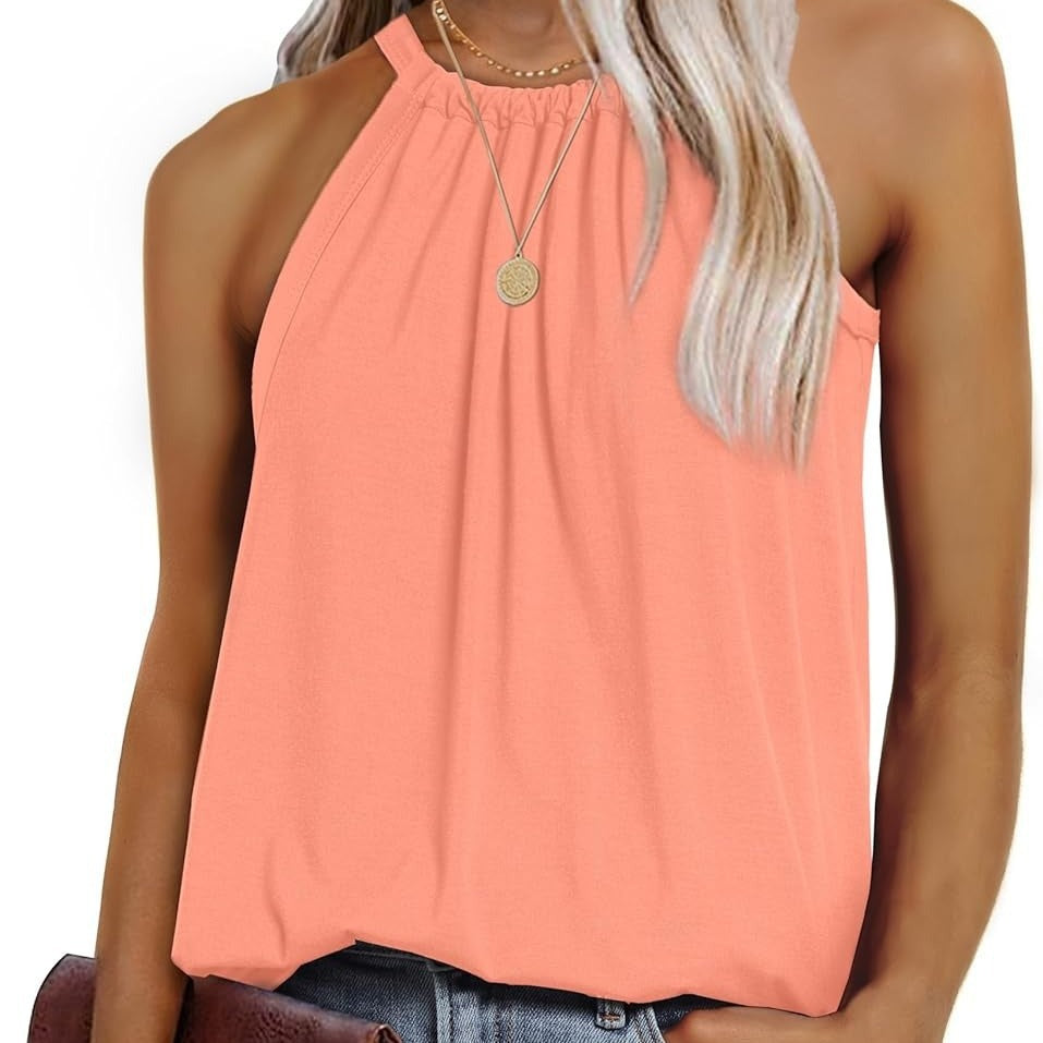 Women's sleeveless top with elegant wrap design and flowing fabric, size S