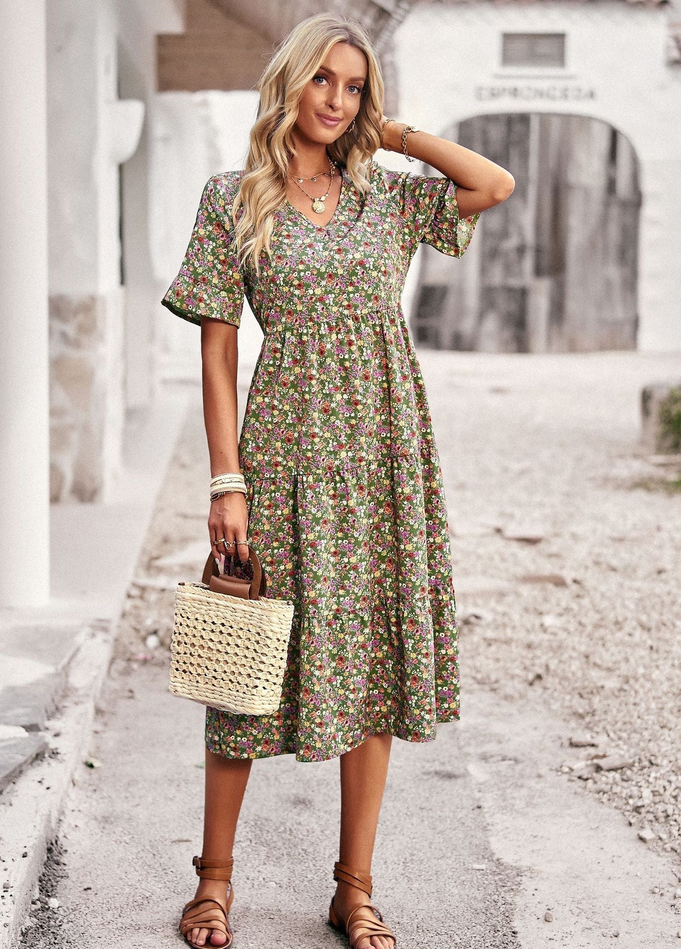 Women's midi dress with floral pattern and playful V-neck, size