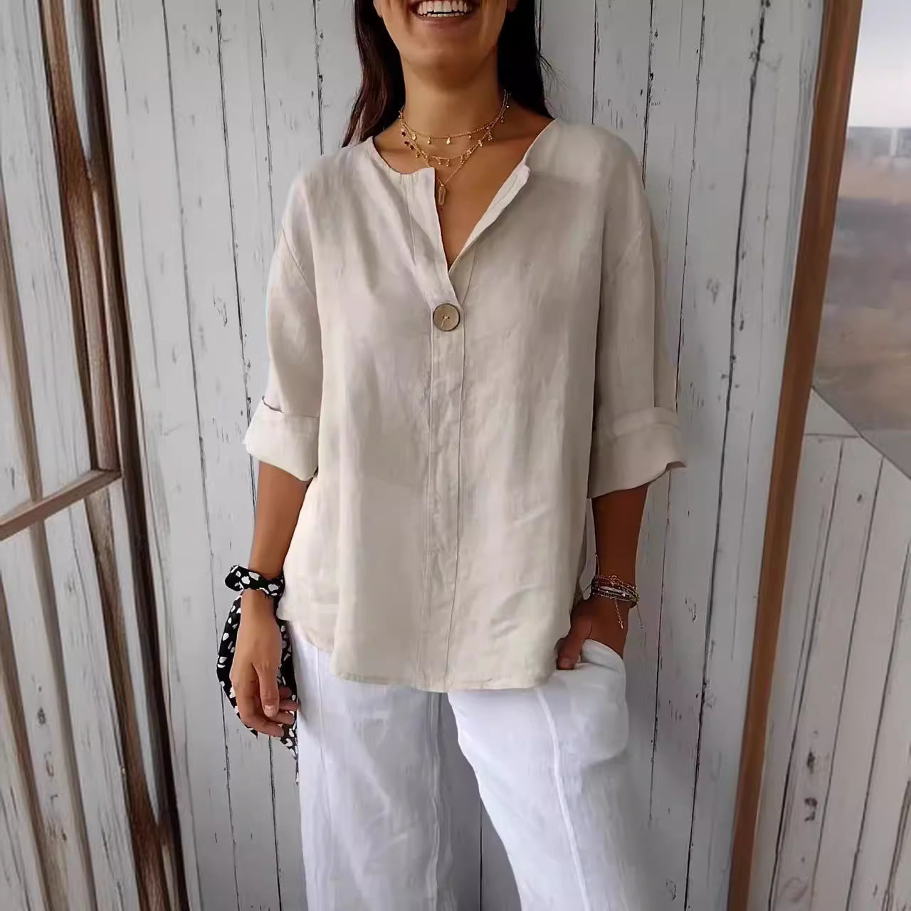 Women's airy linen blouse with front button and wide sleeves, size