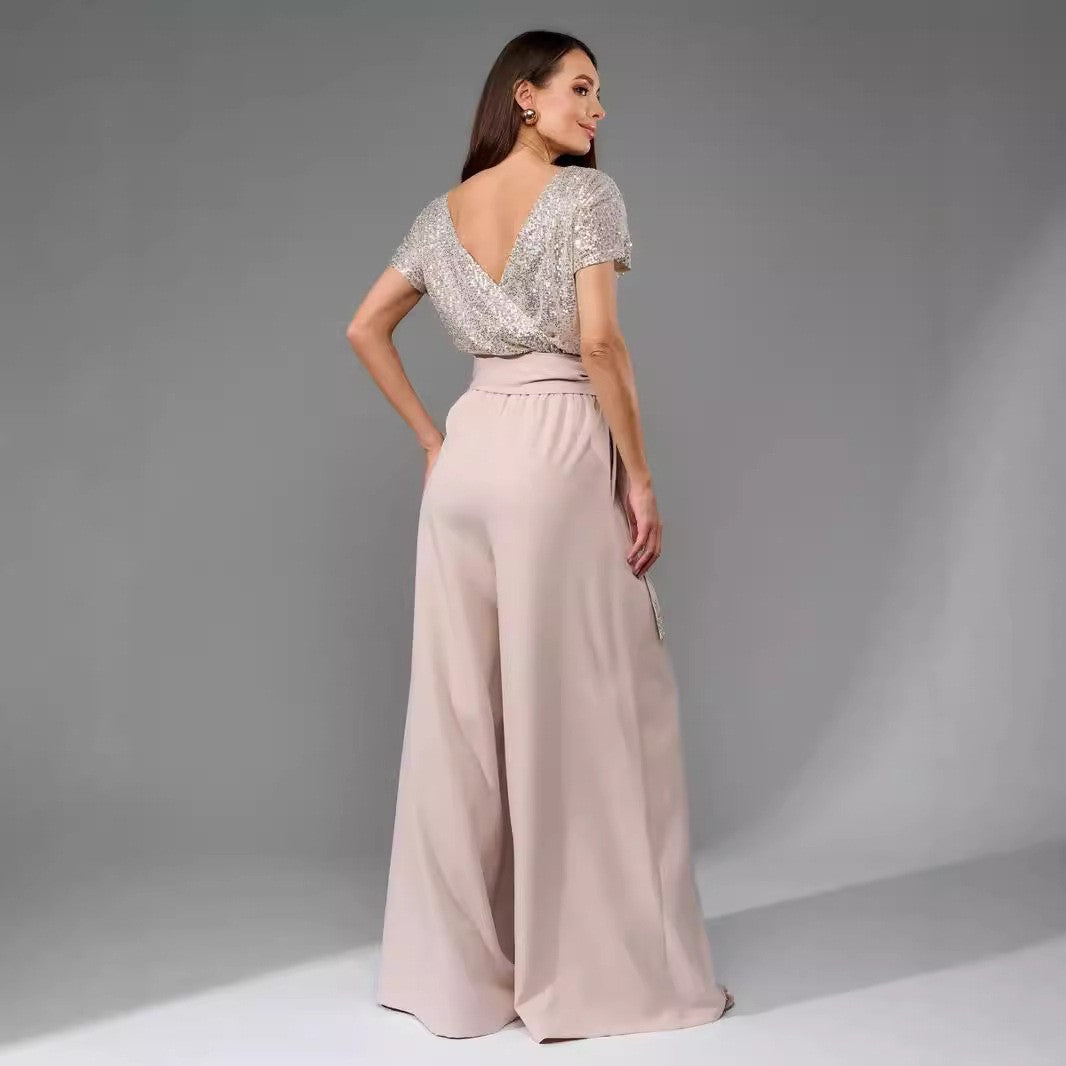 Women's glamorous jumpsuit with glittery top and wide-legged trousers, size