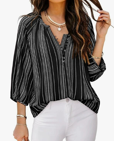 Women's elegant tunic blouse with sophisticated stripes, size