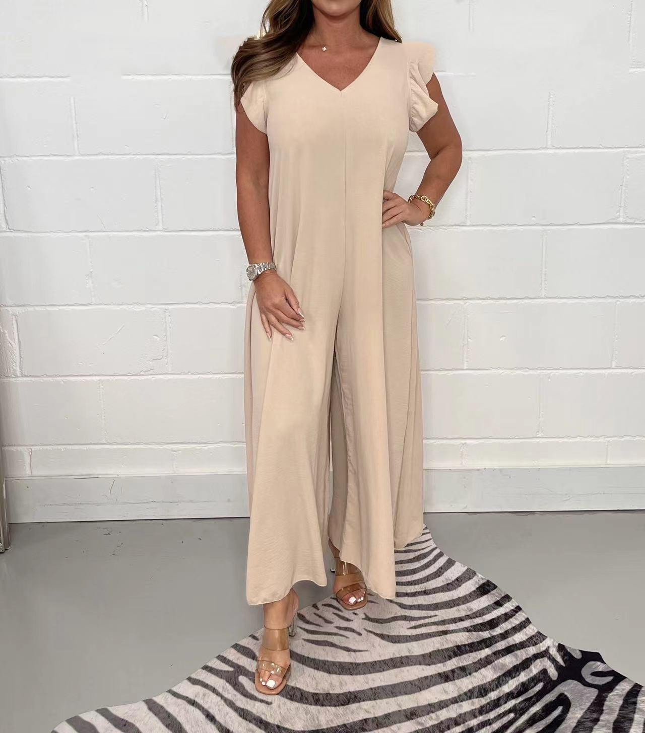 Women's upscale jumpsuit with voluminous ruffled sleeves and V-neck, size S