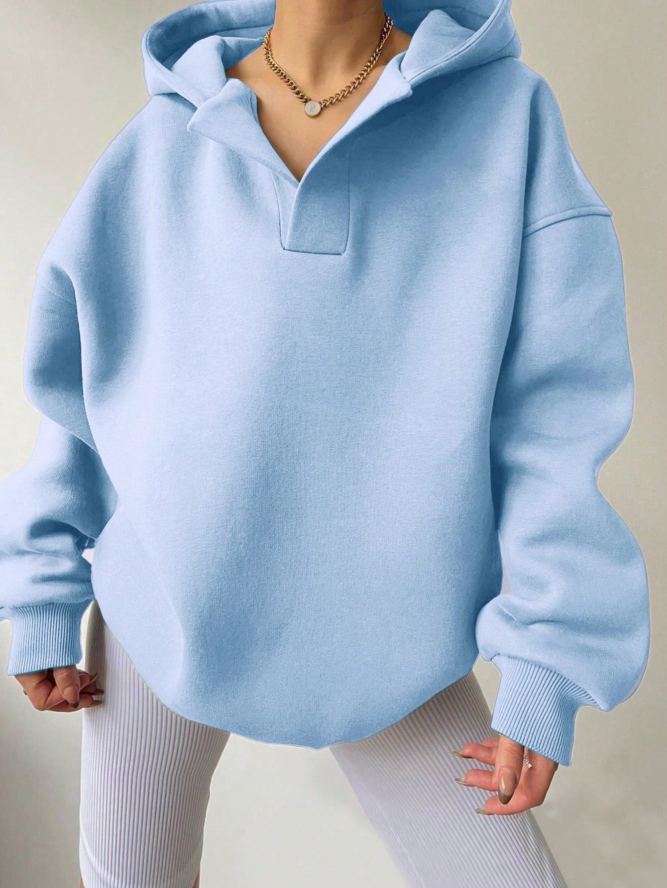 Women's oversized hoodie with a modern collar and relaxed fit, size [size missing]