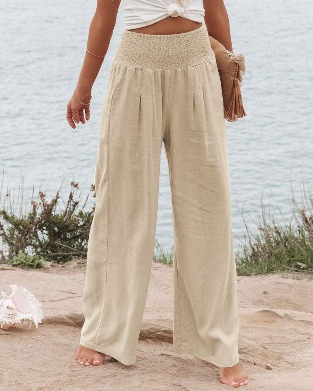 Women's wide-legged linen trousers with elasticated waistband and pleats, size