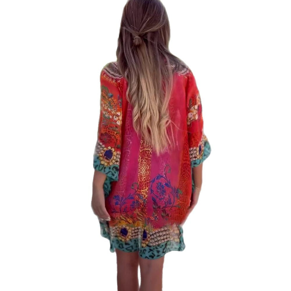 Damen-Strandkleid im farbenfrohen Boho-Stil mit verspieltem Design und tiefem V-Ausschnitt, Größe [size]