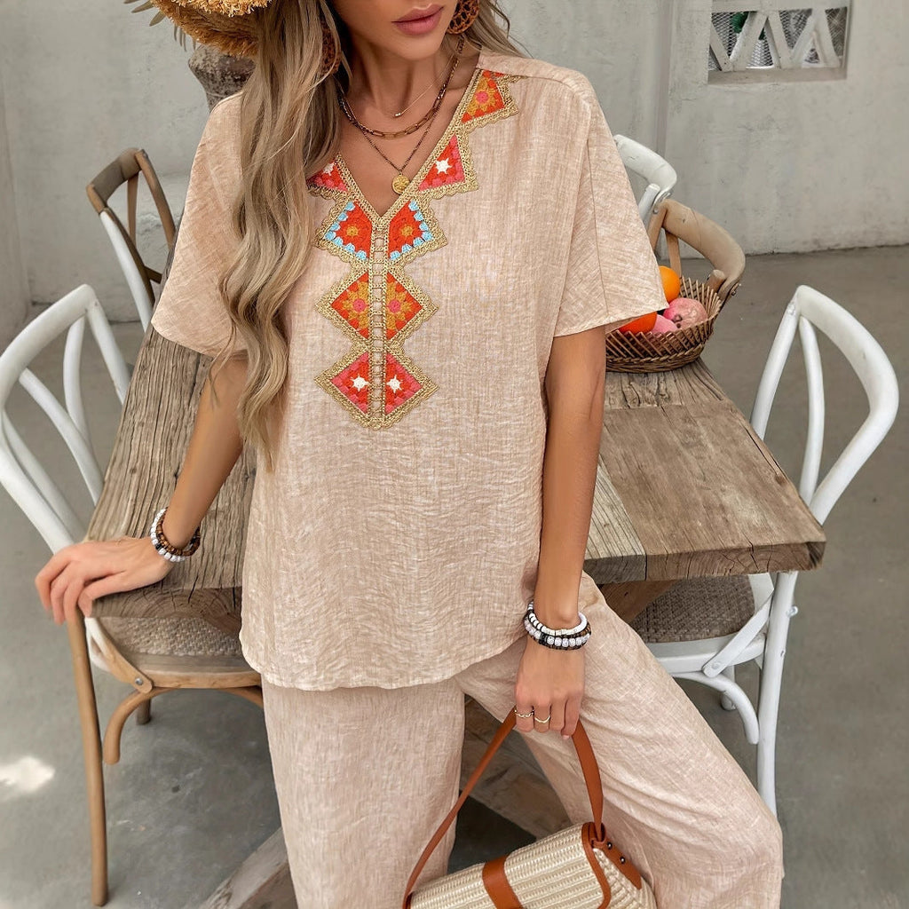 Women's lightweight, airy trouser suit with artistic embroidery, size [size]