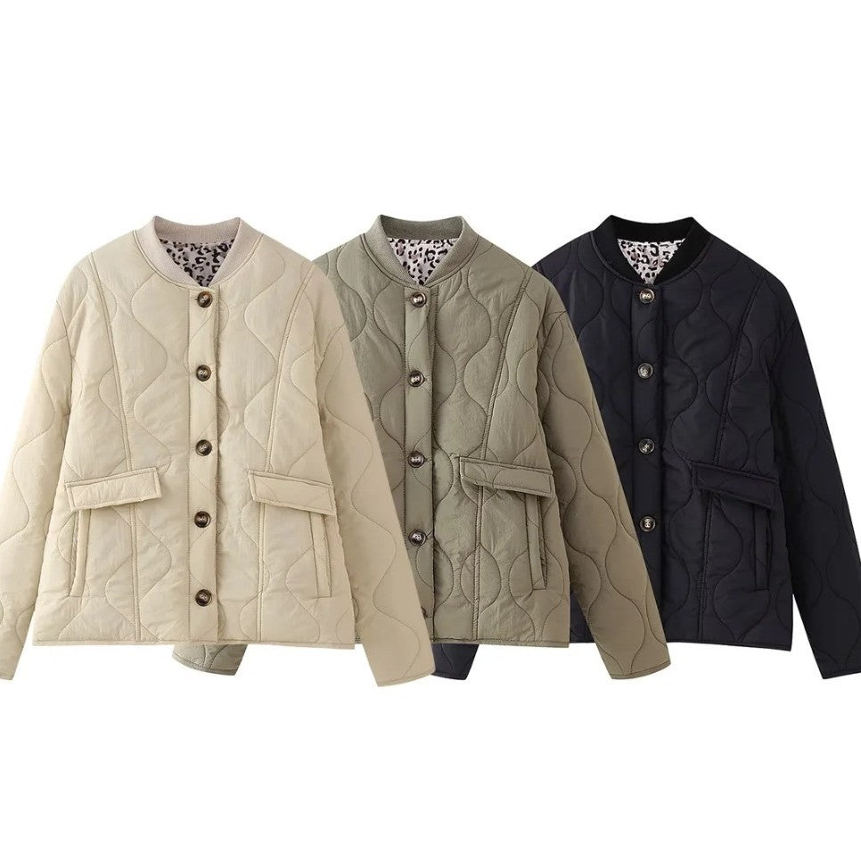 Women's quilted jacket in an elegant design with practical button closure and side pockets, size S