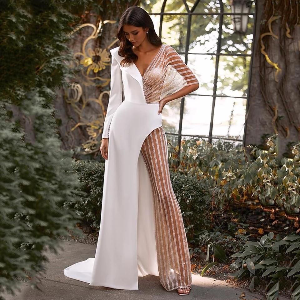 Valenzora | Spitzen-Playsuit mit V-Ausschnitt und unregelmäßigem Saum in Unifarben