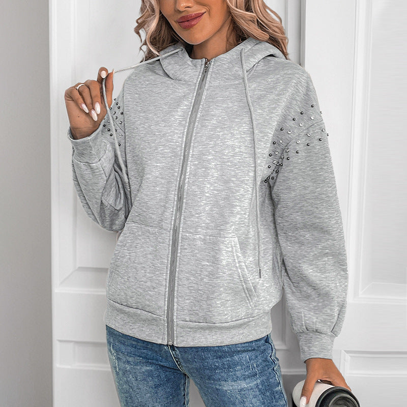 Women's hoodie with decorative studs and a relaxed fit, size S