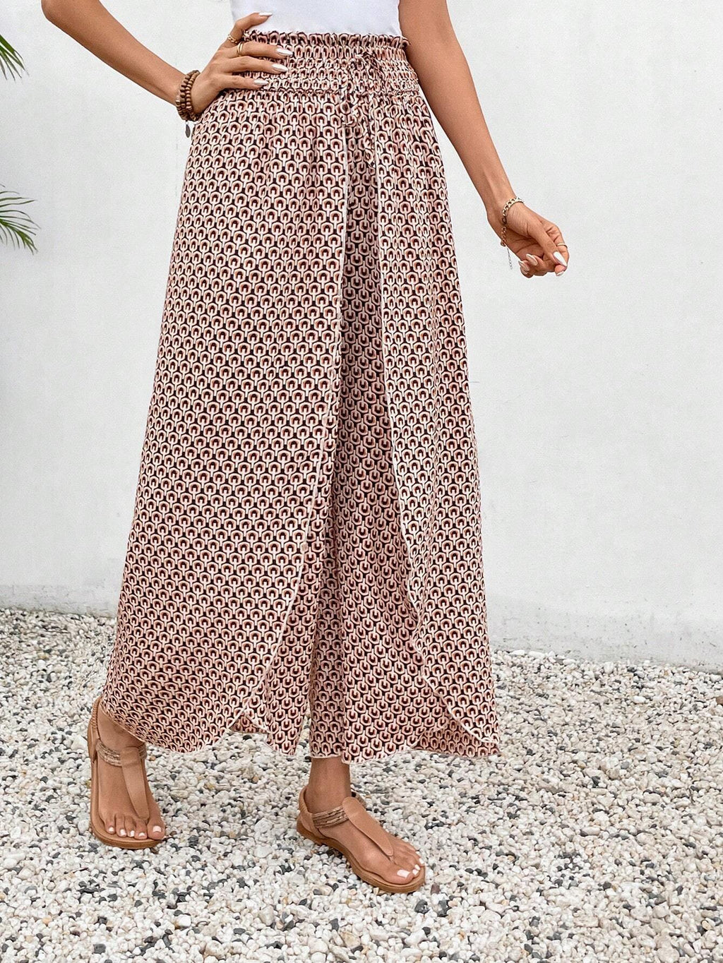 Women's wide-leg summer trousers with elasticated waistband and floral design, size S