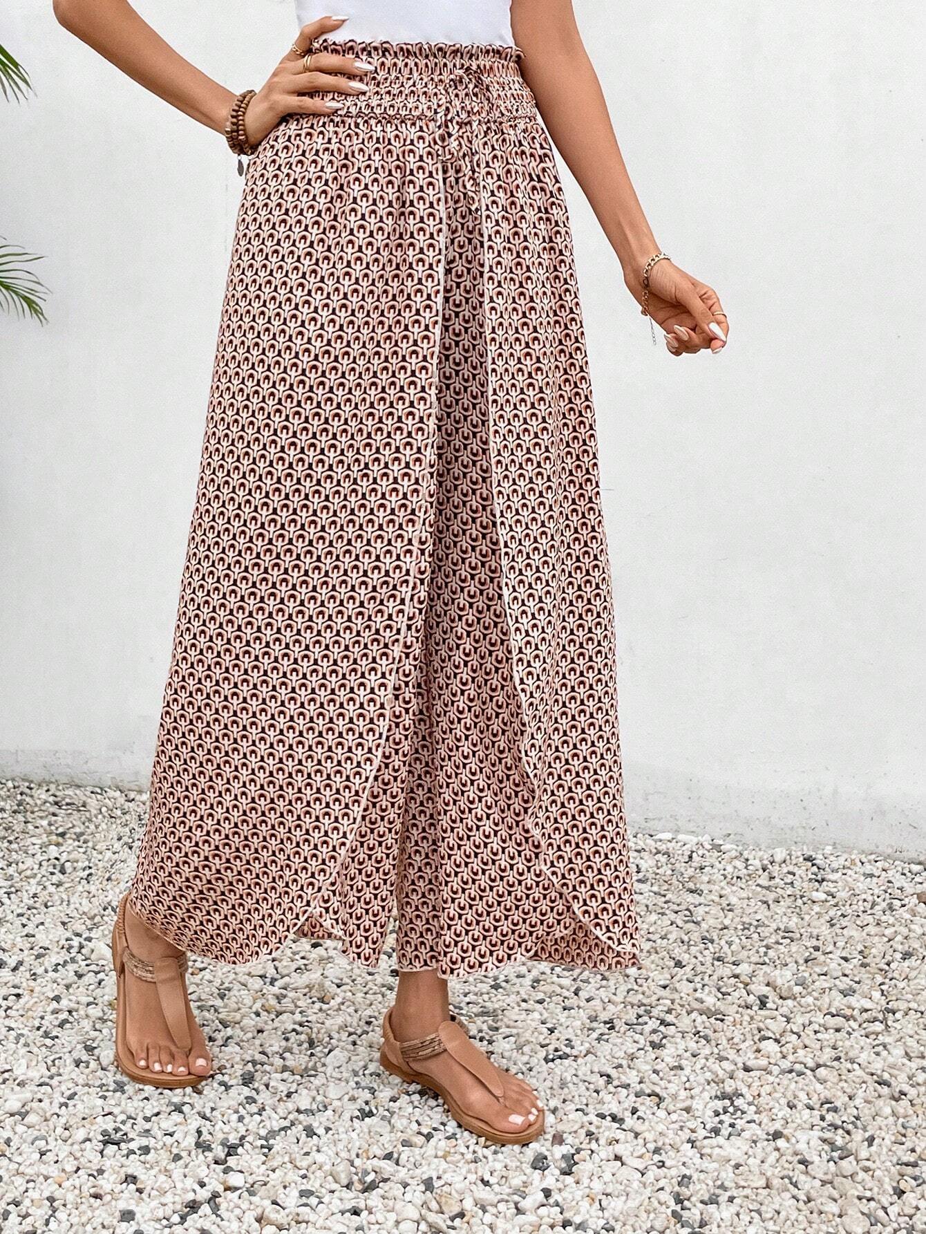 Women's wide-leg summer trousers with elasticated waistband and floral design, size S
