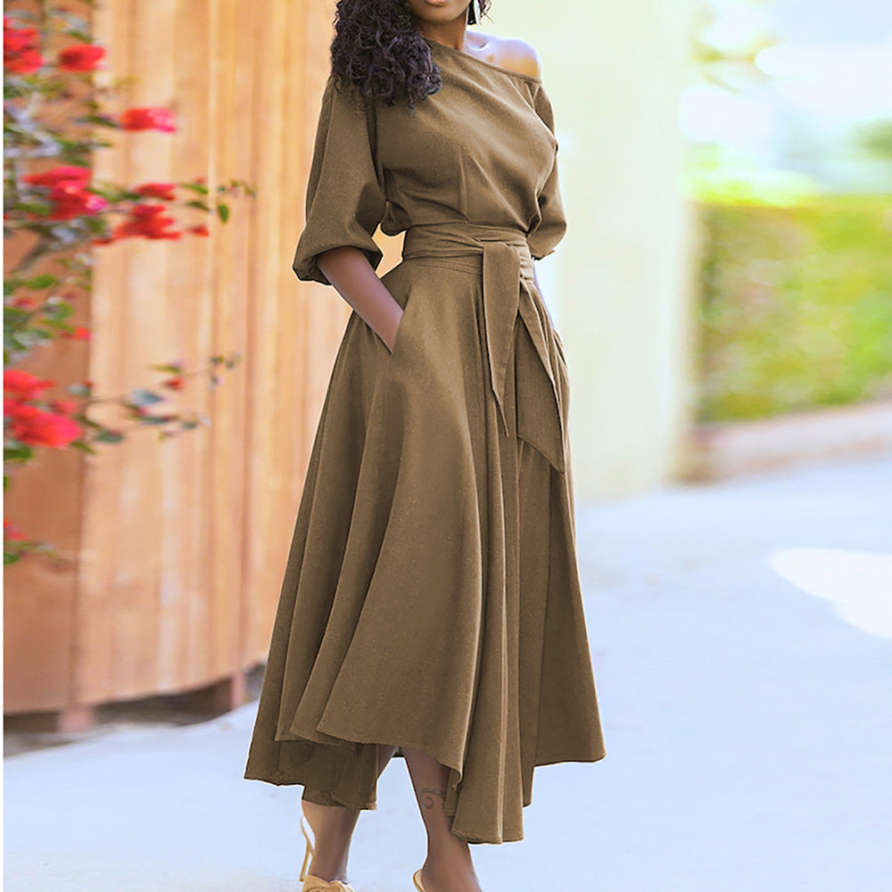 Women's elegant wrap dress with asymmetrical cut and practical pockets, size