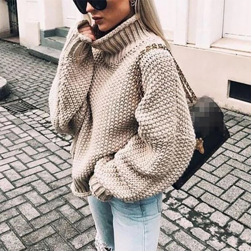 Women's chunky knit sweater with high collar and relaxed fit, size