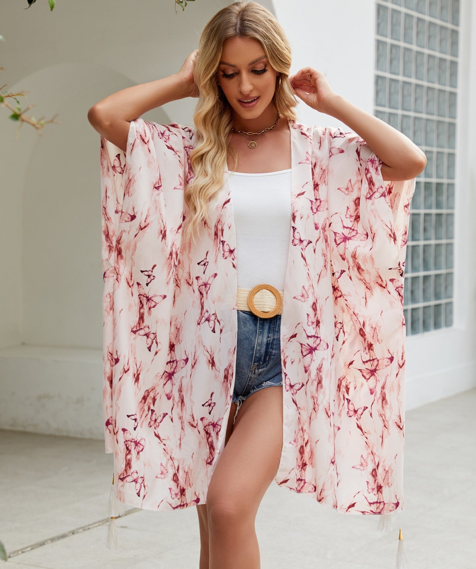 Women's elegant kimono with an artistic floral pattern and fringed edges, size Valenzora
