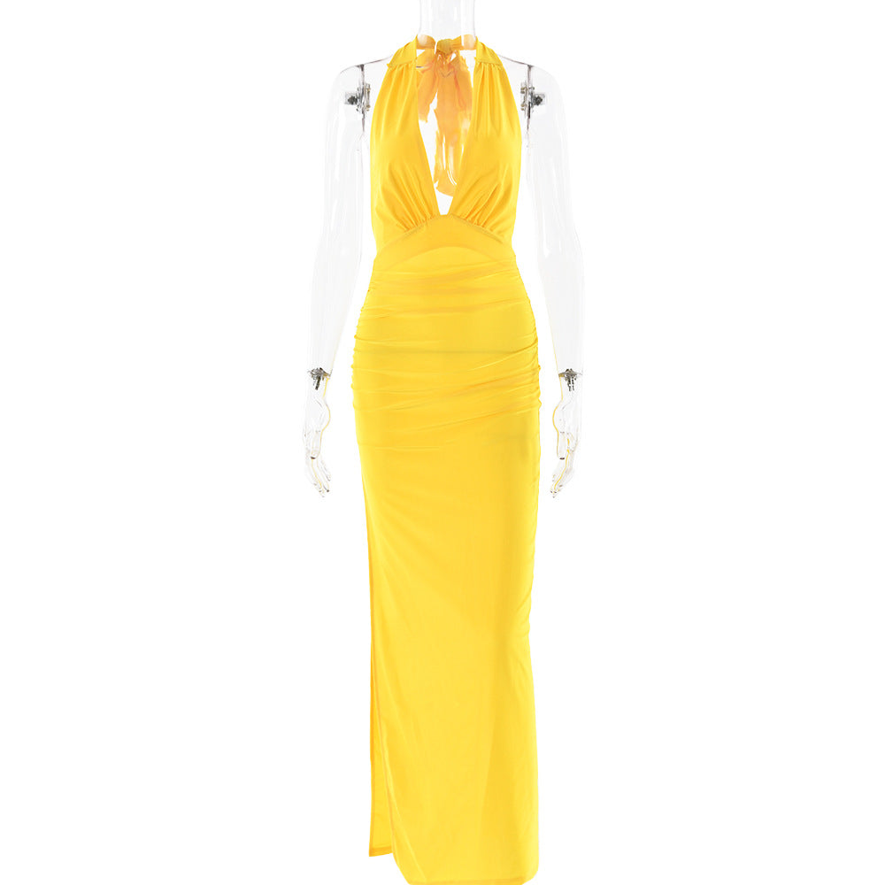 Valenzora | Long, backless dress in a solid color design with a slit