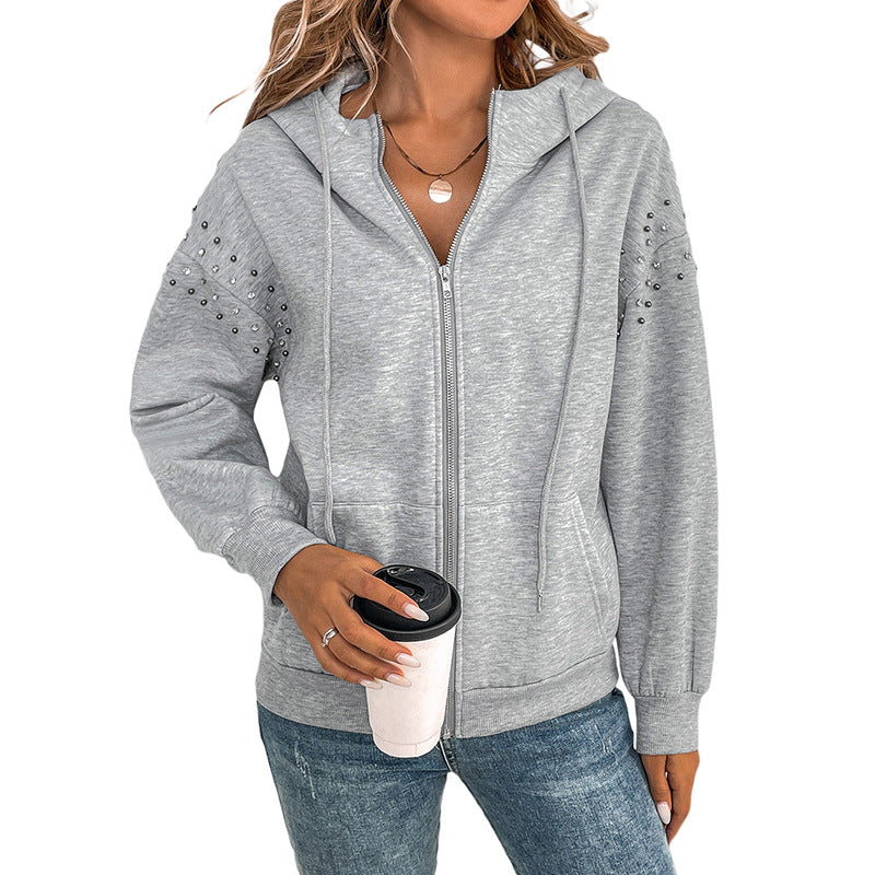 Women's hoodie with decorative studs and a relaxed fit, size S