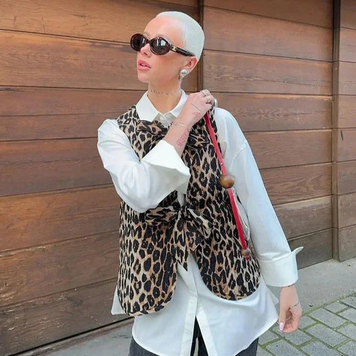 Women's vest in trendy leopard print with playful tie belt, size