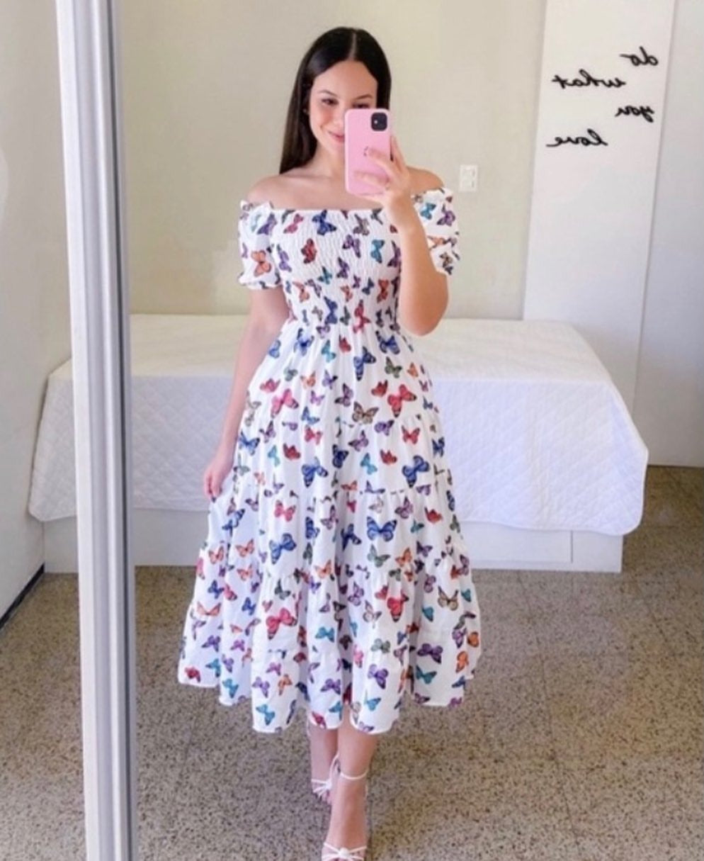 Women's midi dress with off-the-shoulder design and playful butterfly pattern, size S