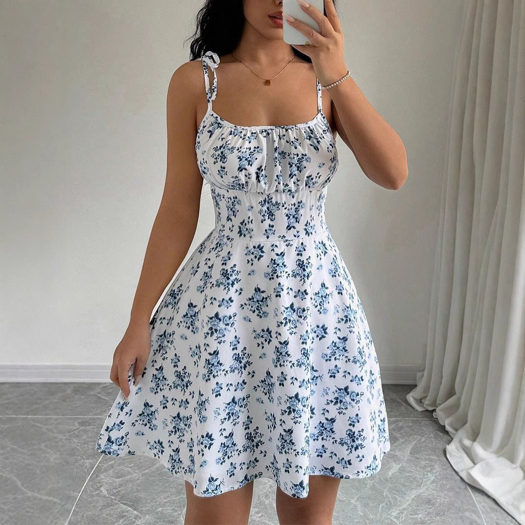 Women's summer dress with adjustable spaghetti straps and floral accents, size [size missing]