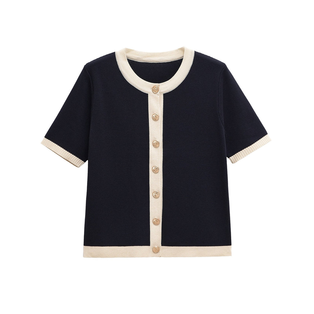 Women's short-sleeved knit top with decorative buttons and modern design, size S