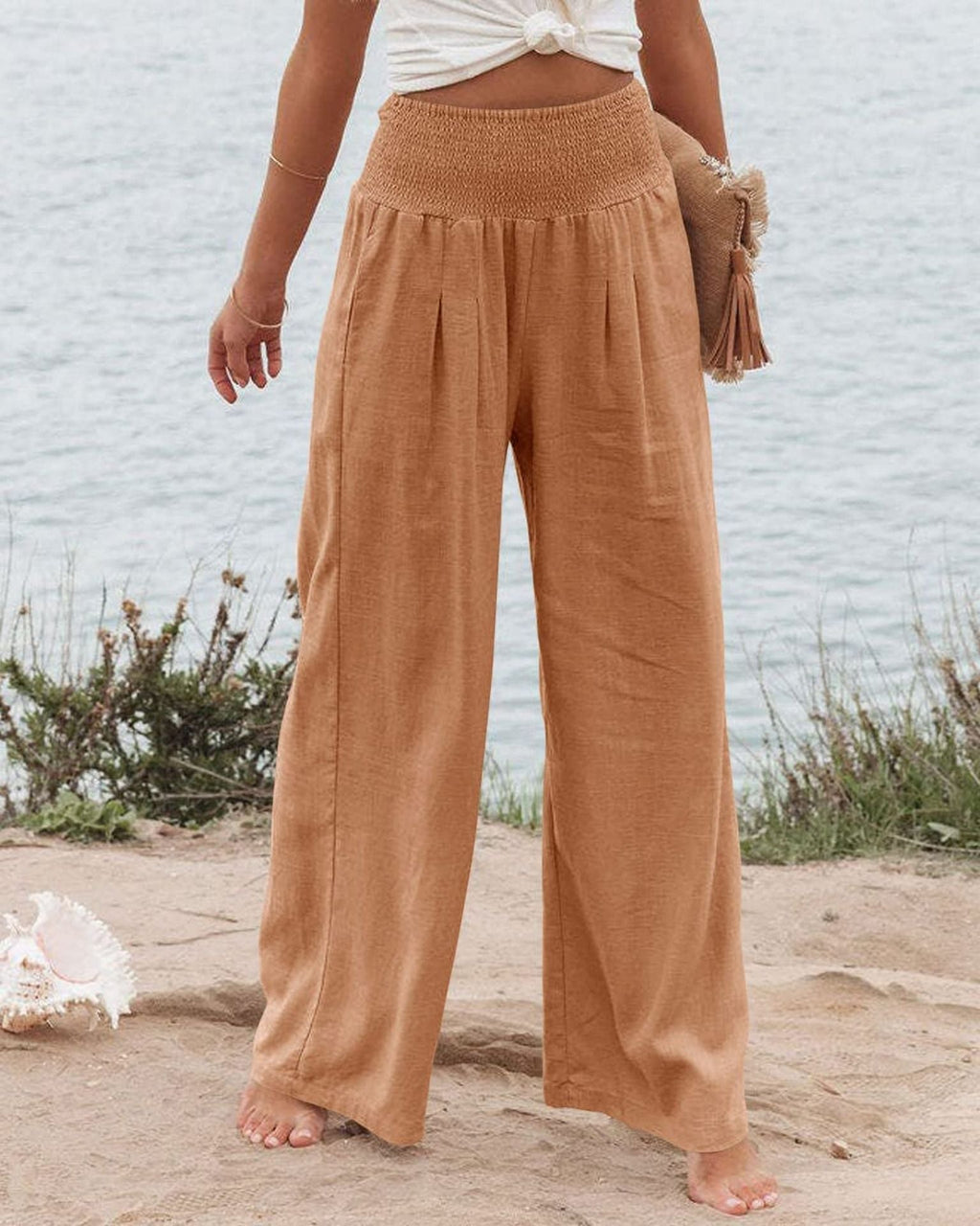 Women's wide-legged linen trousers with elasticated waistband and pleats, size