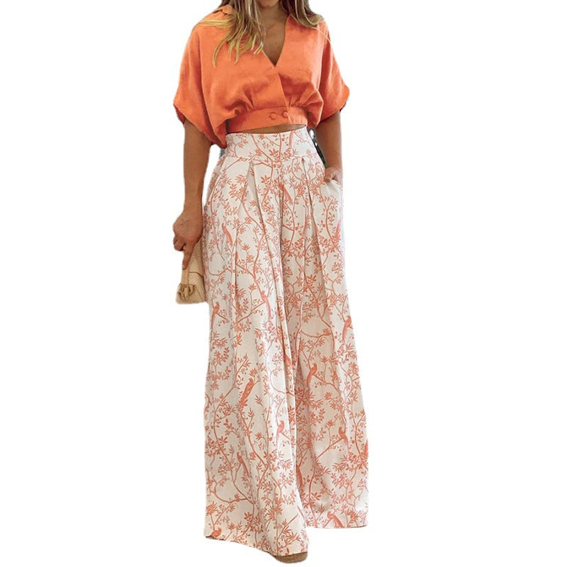 Women's crop top suit with wide skirt and floral pattern, size
