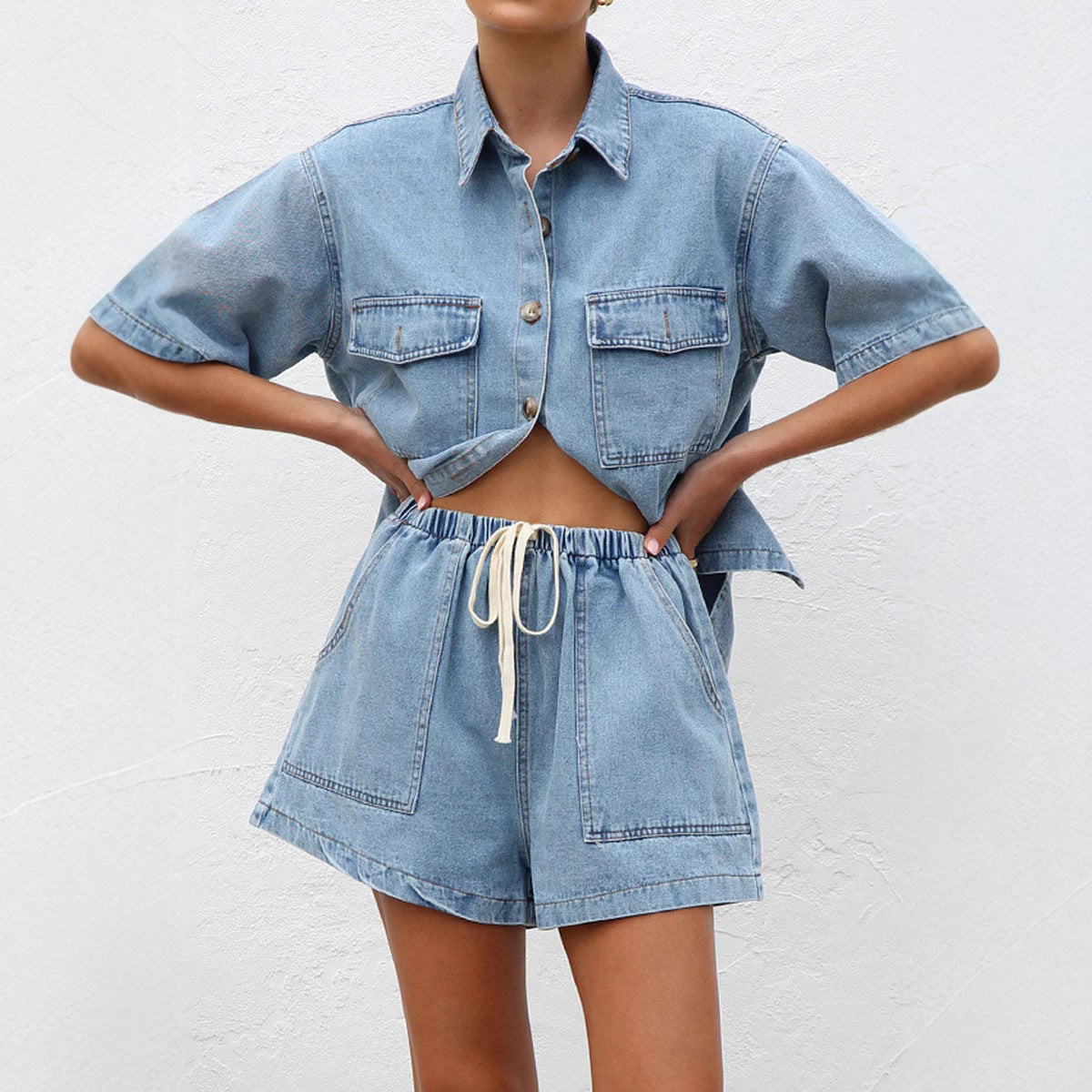 Women's denim crop top and shorts set with practical pockets and a relaxed fit, size S